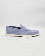 Shop the D032018 slip-on loafer in light blue suede calf leather. Italian-made with a soft unstructured silhouette and rubber sole. Relaxed everyday elegance.