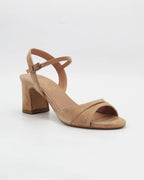 RIVOLI23 block heel sandal in sabbia suede with a soft cut-out toe strap and adjustable ankle strap. Handcrafted in Italy. Elegant, easy to wear.