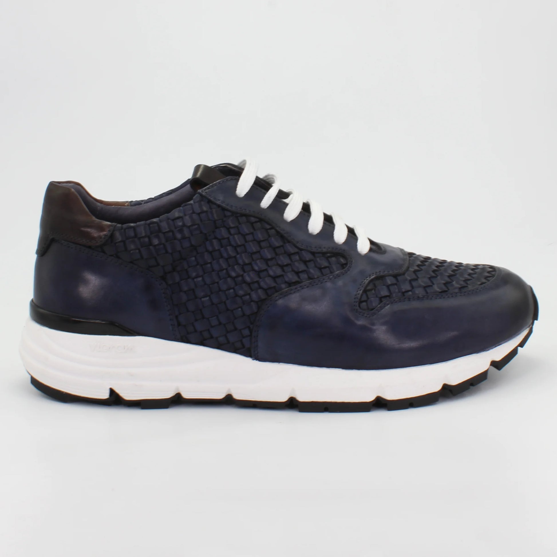 Shop Handmade Italian Leather woven sneaker in navy blue (BRU11375) or browse our range of hand-made Italian shoes for men in leather or suede in-store at Aliverti Cape Town, or shop online. We deliver in South Africa & offer multiple payment plans as well as accept multiple safe & secure payment methods.