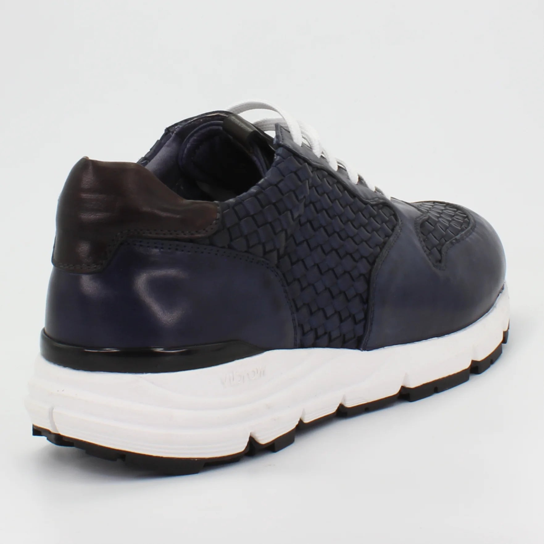 Shop Handmade Italian Leather woven sneaker in navy blue (BRU11375) or browse our range of hand-made Italian shoes for men in leather or suede in-store at Aliverti Cape Town, or shop online. We deliver in South Africa & offer multiple payment plans as well as accept multiple safe & secure payment methods.