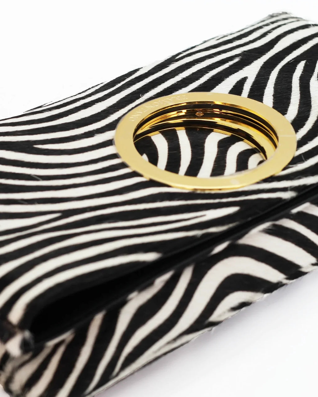 Shop Women's Italian-made Tramontano Italian leather clutch handbag in zebra (TRAM1034) or browse our range of hand-made Italian handbags for women in-store at Aliverti Cape Town, or shop online. 

We deliver in South Africa & offer multiple payment plans as well as accept multiple safe & secure payment methods.