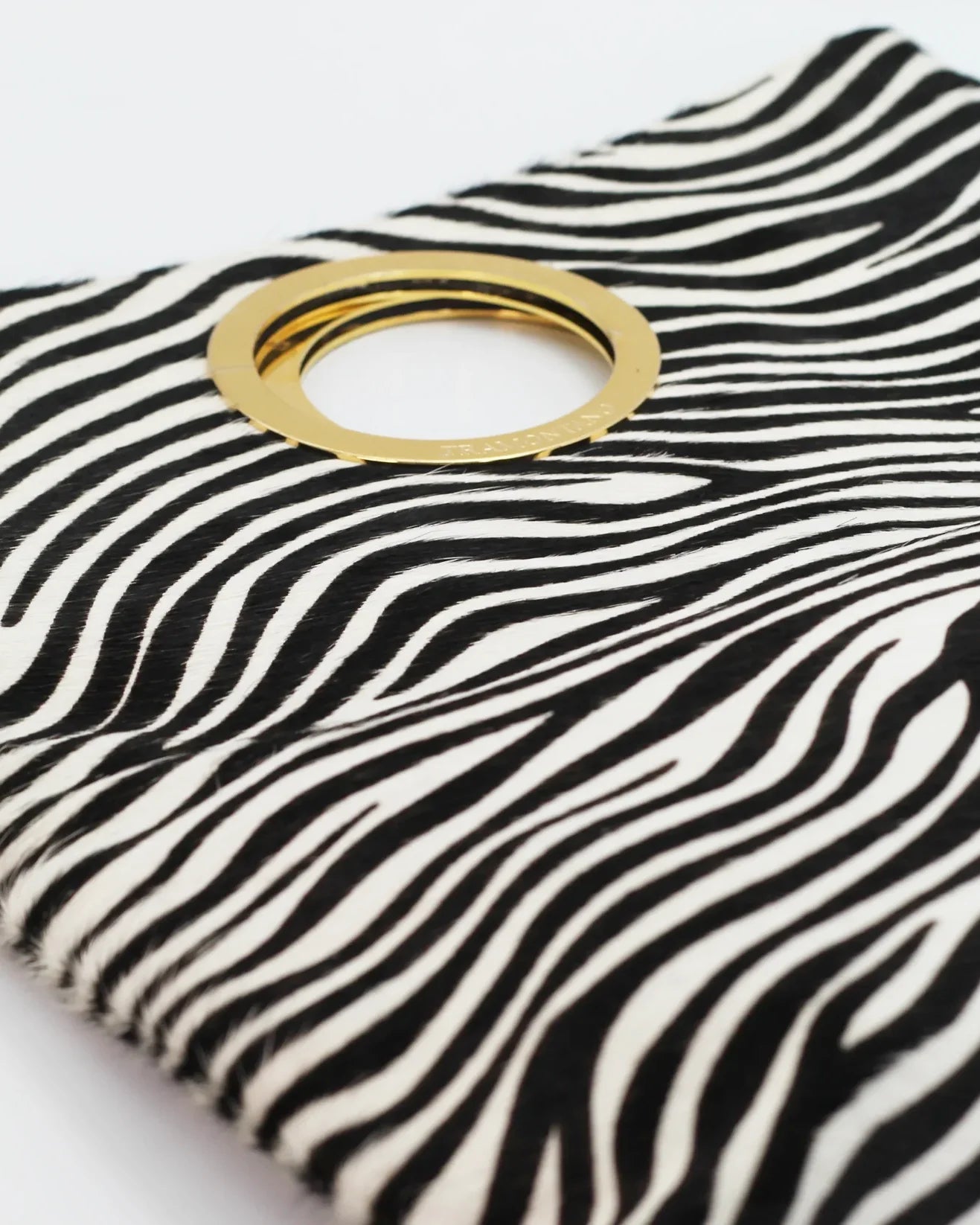 Shop Women's Italian-made Tramontano Italian leather clutch handbag in zebra (TRAM1034) or browse our range of hand-made Italian handbags for women in-store at Aliverti Cape Town, or shop online. 

We deliver in South Africa & offer multiple payment plans as well as accept multiple safe & secure payment methods.