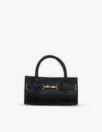 Mini bag made of precious lambskin with a crumpled effect and a delicate glossy finish, with double handles and a removable leather shoulder strap.
The bag is embellished on both the front and back with the iconic Tramontano archive accessory, in handcrafted gold-plated brass.
Top closure with magnet.

Microfiber lining.&nbsp;Gold-finish accessories.

Material:&nbsp;Moon lamb
Dimensions:&nbsp;25x13x10.5 cm