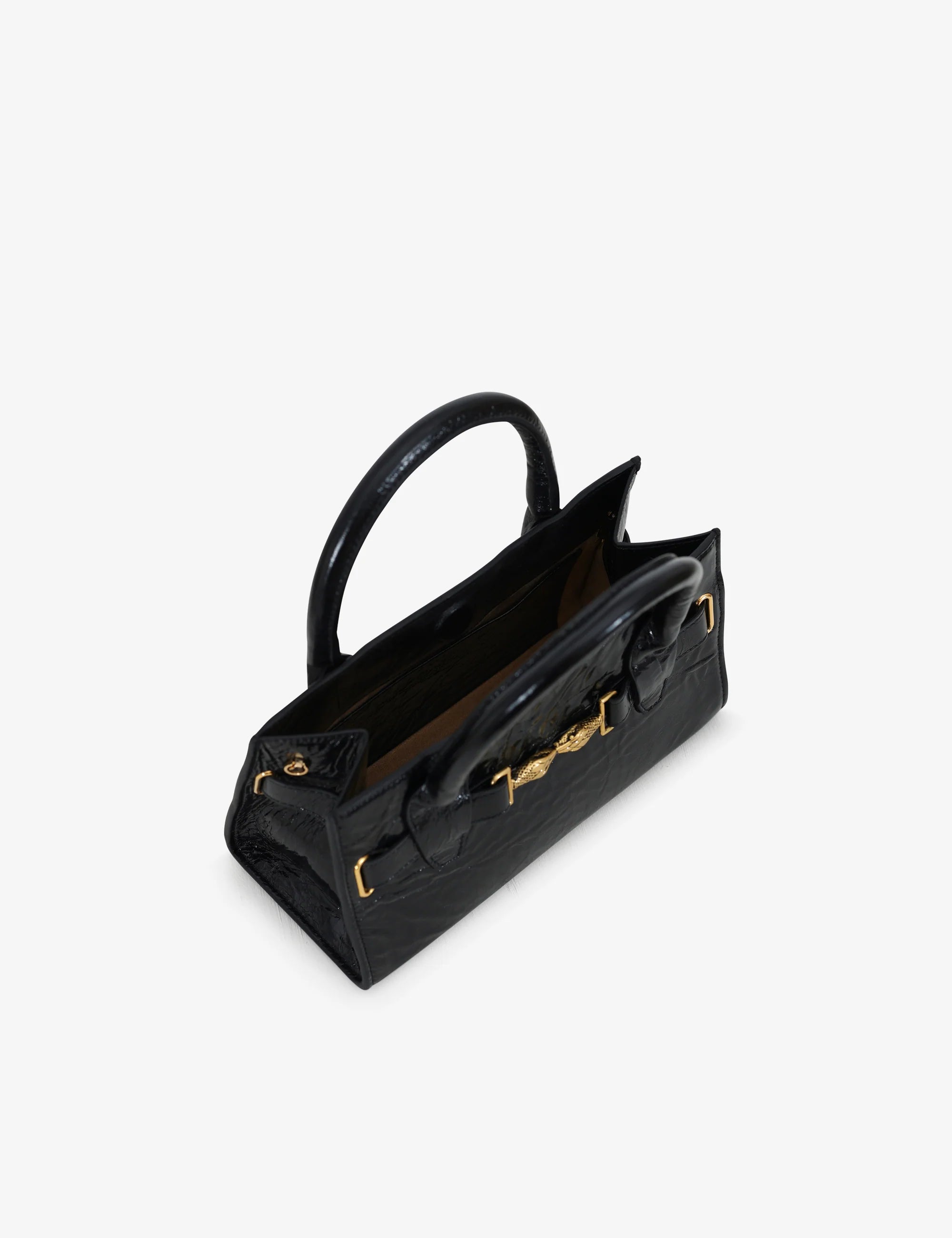 Mini bag made of precious lambskin with a crumpled effect and a delicate glossy finish, with double handles and a removable leather shoulder strap.
The bag is embellished on both the front and back with the iconic Tramontano archive accessory, in handcrafted gold-plated brass.
Top closure with magnet.

Microfiber lining.&nbsp;Gold-finish accessories.

Material:&nbsp;Moon lamb
Dimensions:&nbsp;25x13x10.5 cm