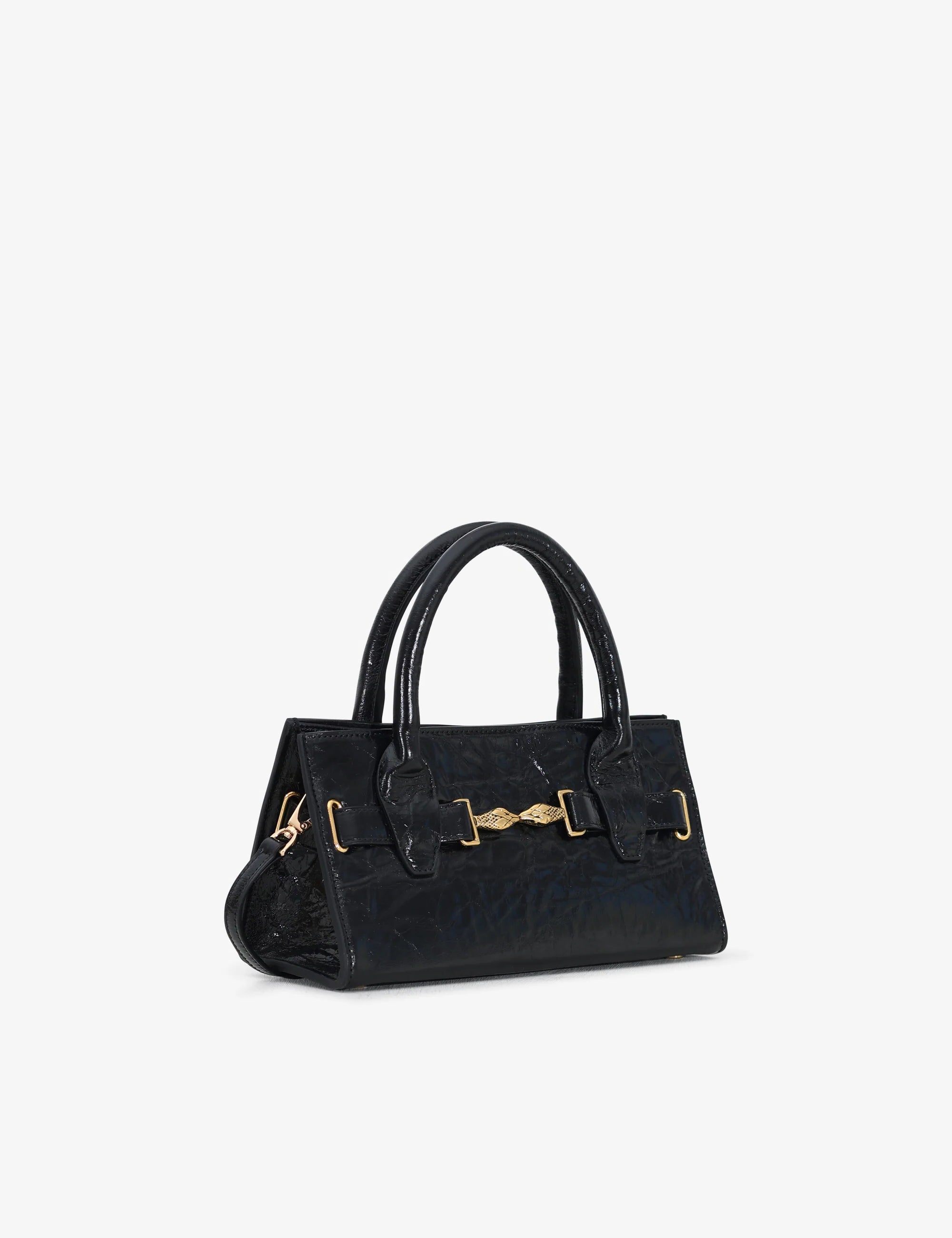 Mini bag made of precious lambskin with a crumpled effect and a delicate glossy finish, with double handles and a removable leather shoulder strap.
The bag is embellished on both the front and back with the iconic Tramontano archive accessory, in handcrafted gold-plated brass.
Top closure with magnet.

Microfiber lining.&nbsp;Gold-finish accessories.

Material:&nbsp;Moon lamb
Dimensions:&nbsp;25x13x10.5 cm