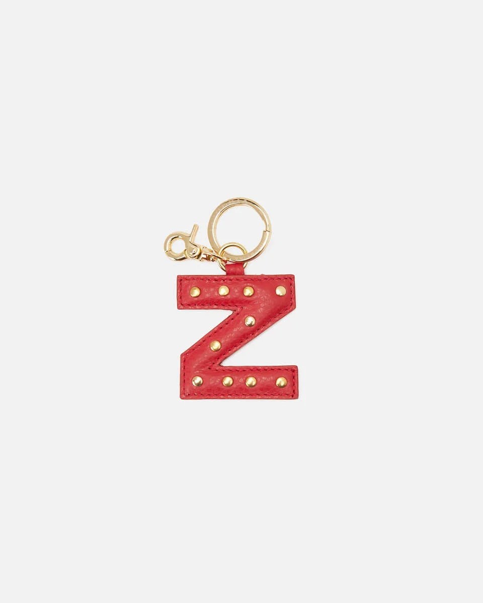 Your initial, in leather. Handcrafted by Cuoieria Fiorentina in Florence from soft full-grain calfskin - treated to a fine, uniform grain that feels as good as it looks. Gold-finish studs, a gold carabiner clip, and the kind of quiet personalisation that says exactly what it needs to without saying a word. Made in Italy. Made to be yours.