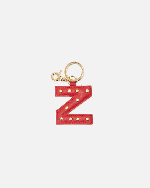 Your initial, in leather. Handcrafted by Cuoieria Fiorentina in Florence from soft full-grain calfskin - treated to a fine, uniform grain that feels as good as it looks. Gold-finish studs, a gold carabiner clip, and the kind of quiet personalisation that says exactly what it needs to without saying a word. Made in Italy. Made to be yours.