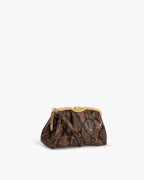 Clutch made of precious snake leather, finished with a golden metal closure, personalized Tramontano.
The bag can be worn on the shoulder thanks to the removable leather shoulder strap.
Unique internal compartment with small leather pocket.

Microfiber inner lining.
Accessories with gold finish.

Material: Snake Elaphe
Dimensions: 26x15X8