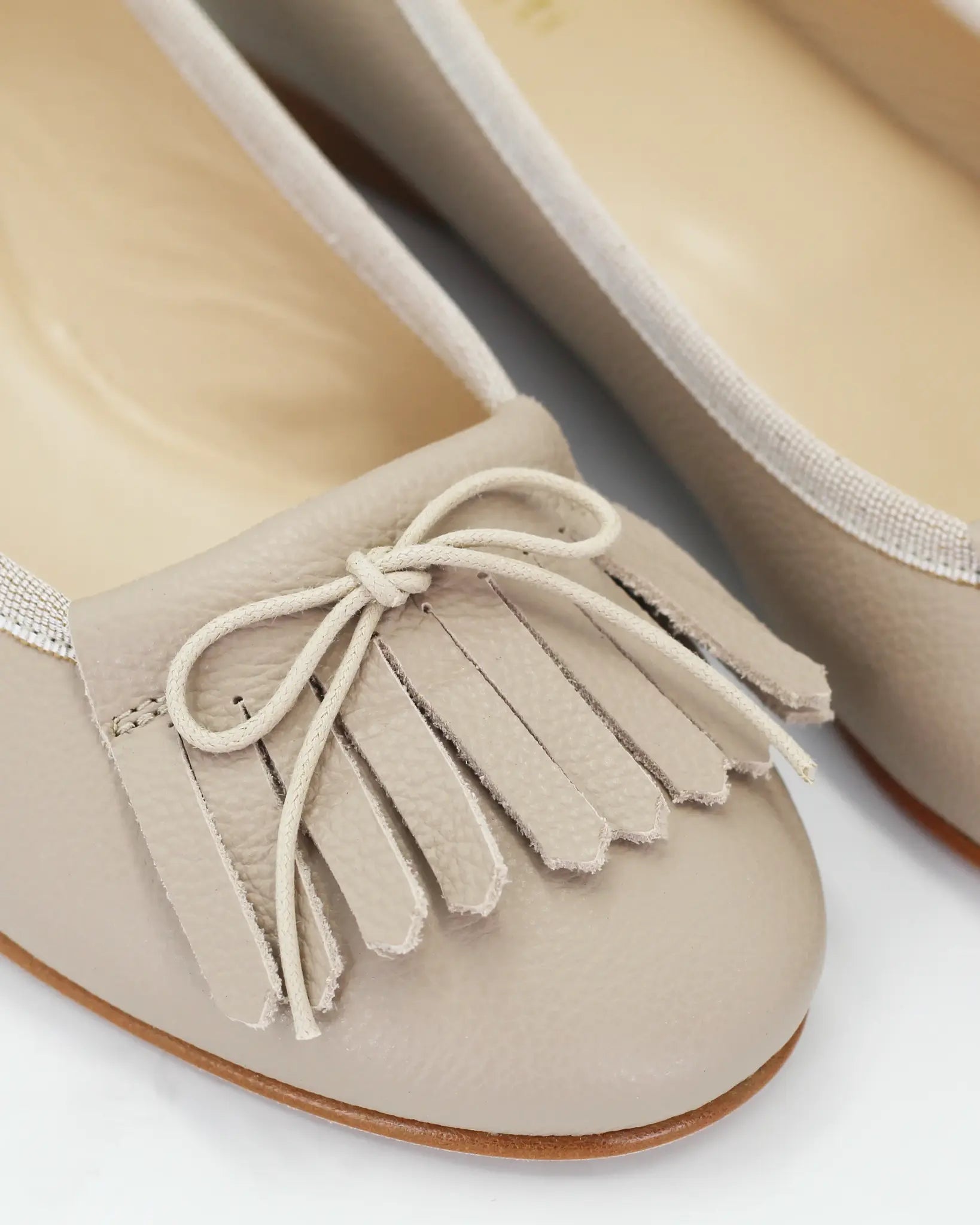 Shop Handmade Women's Ballerina Pump with Fringe in Calf Leather Beige or browse our range of hand-made Italian shoes in leather or suede in-store at Aliverti Cape Town, or shop online. We deliver in South Africa & offer multiple payment plans as well as accept multiple safe & secure payment methods.