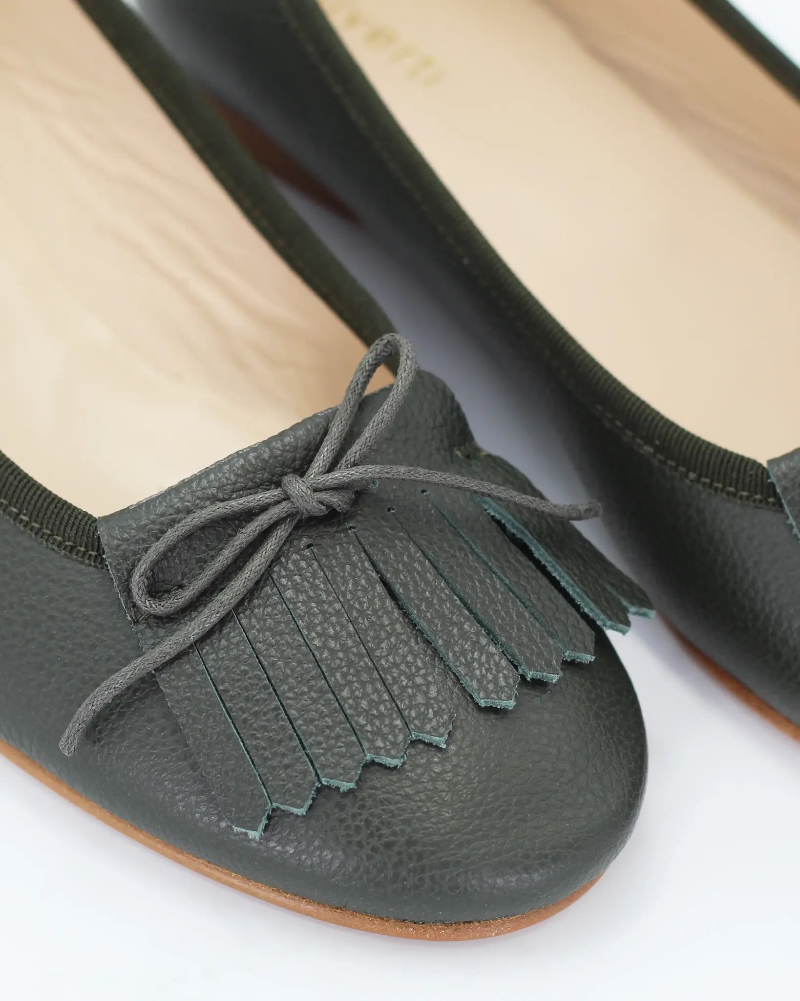 Shop Handmade Women's Ballerina Pump with Fringe in Calf Leather Militare or browse our range of hand-made Italian shoes in leather or suede in-store at Aliverti Cape Town, or shop online. We deliver in South Africa & offer multiple payment plans as well as accept multiple safe & secure payment methods.