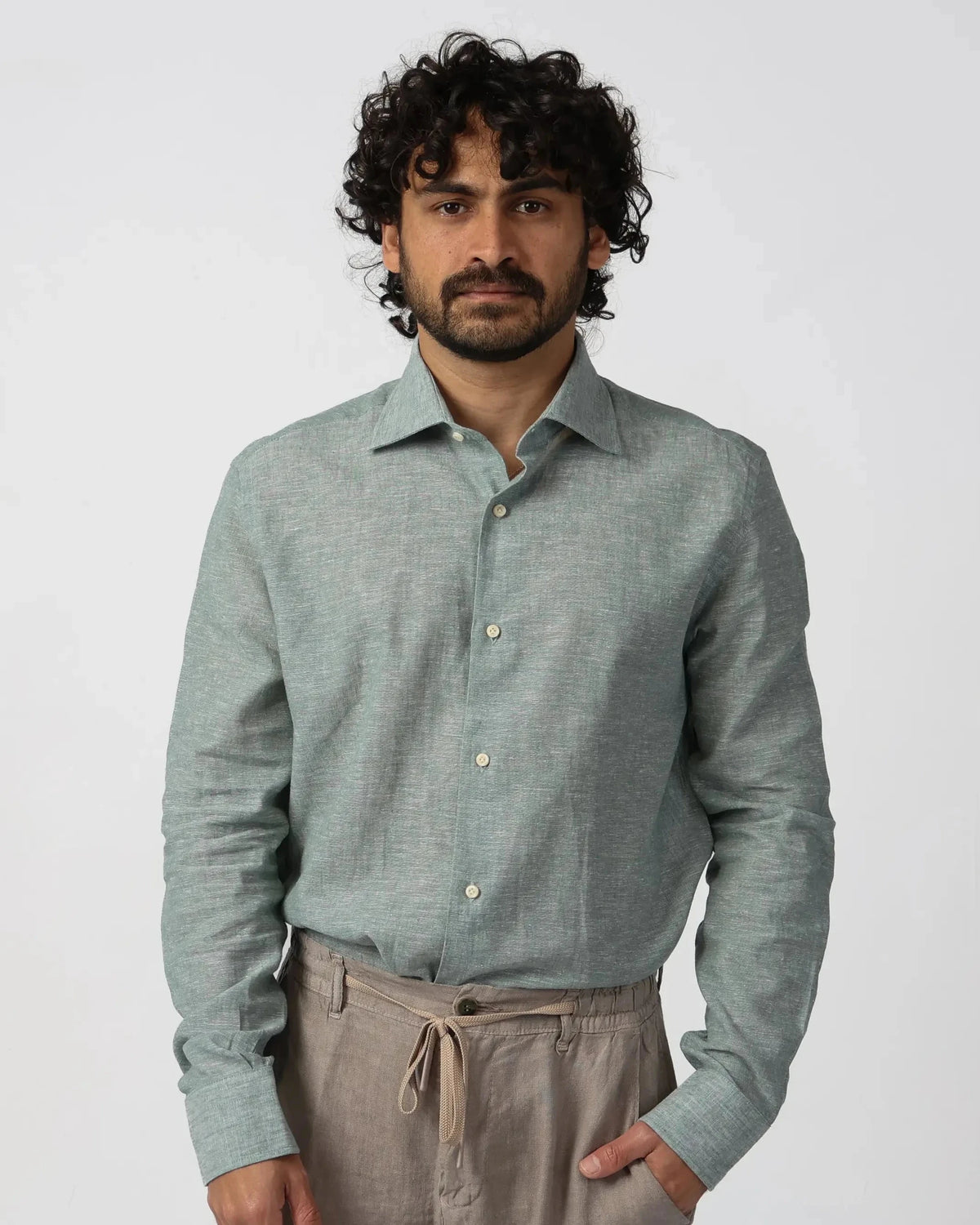 Men's green cotton-linen shirt by Fiftieth. Breathable melange weave, relaxed fit — a versatile layer for warm-weather dressing.