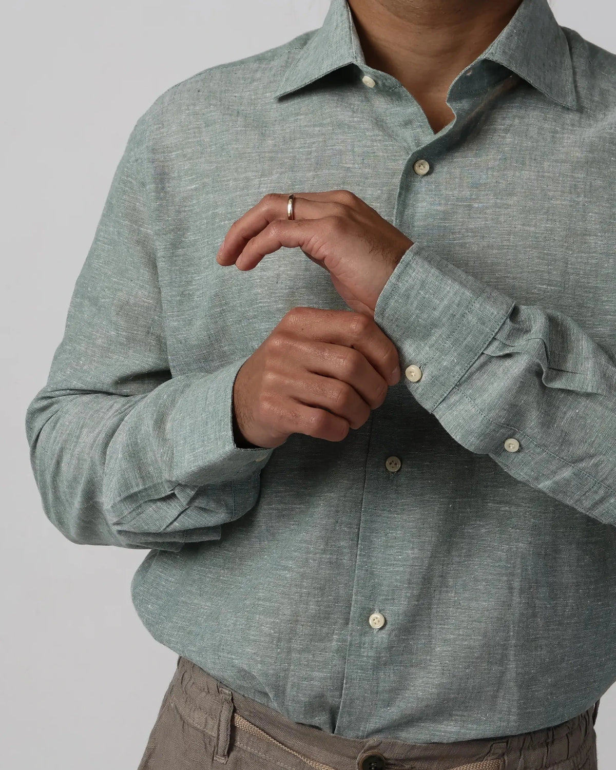 Men's grey-green cotton-linen shirt by Fiftieth. Breathable melange weave, relaxed fit — a versatile layer for warm-weather dressing.