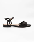 PATTY26 flat two-strap sandal in testa di moro calf leather with a soft cut-out toe strap and adjustable ankle strap. Handcrafted in Italy. Easy everyday wear.
