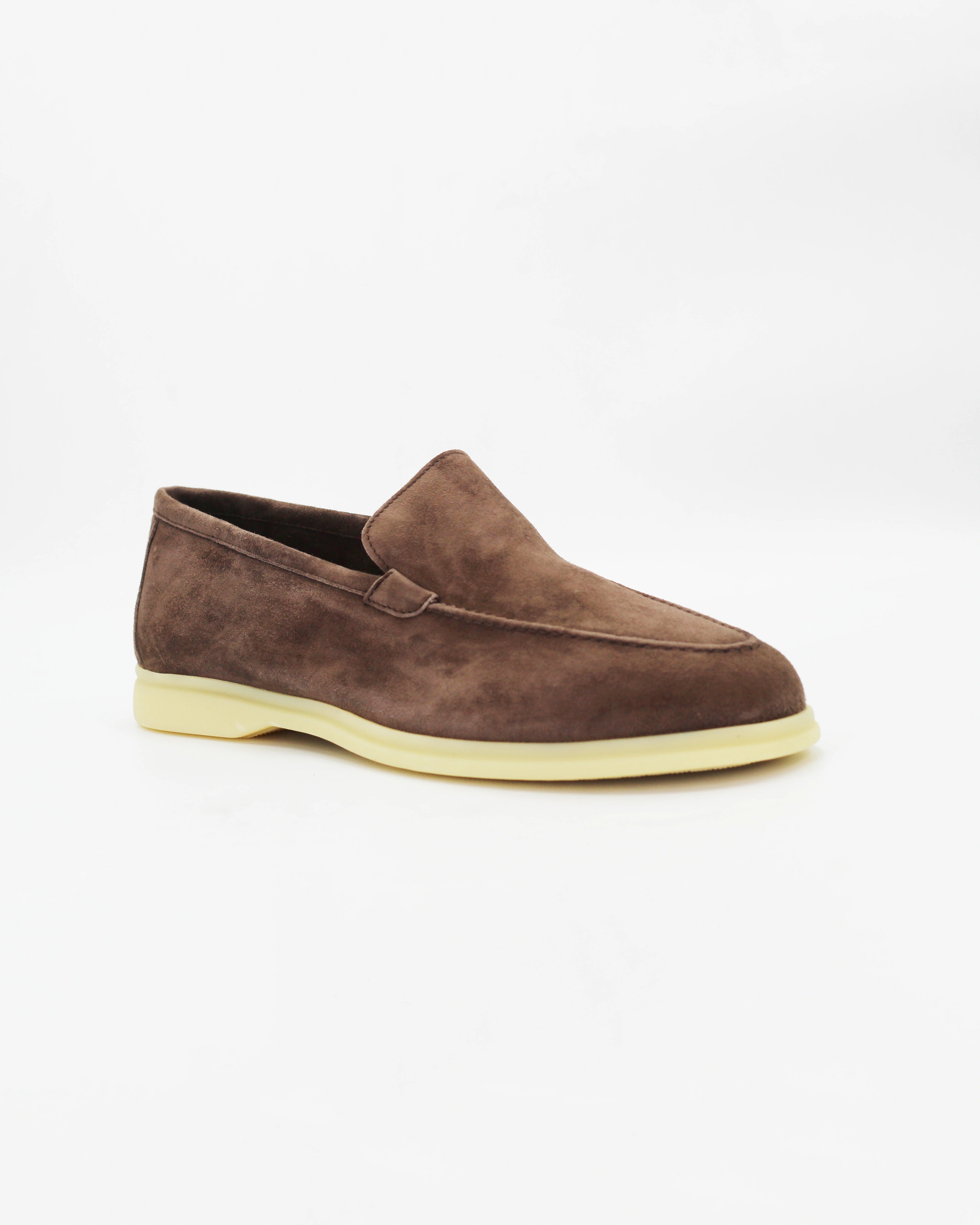Shop the UO32017 slip-on loafer in cocco suede calf leather. Italian-made with a soft unstructured silhouette and rubber sole. Refined everyday elegance.